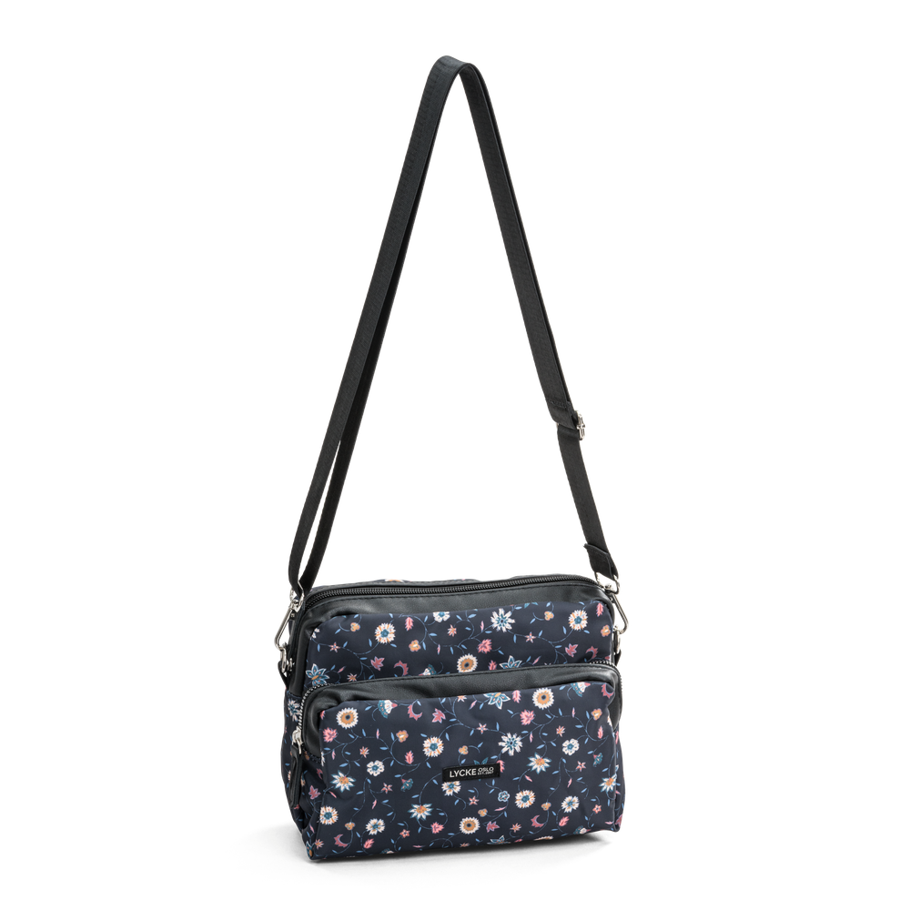 Axelväska i crossbodymodell