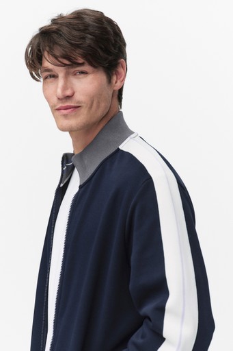 Taped track top