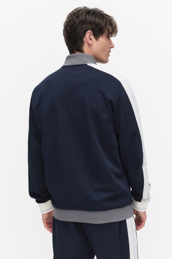 Taped track top