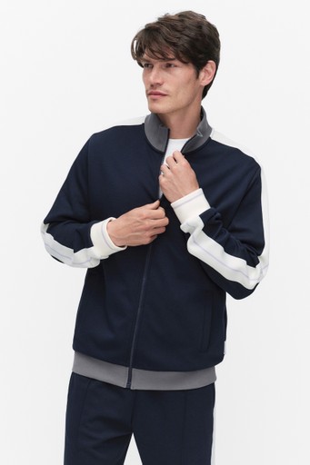 Taped track top