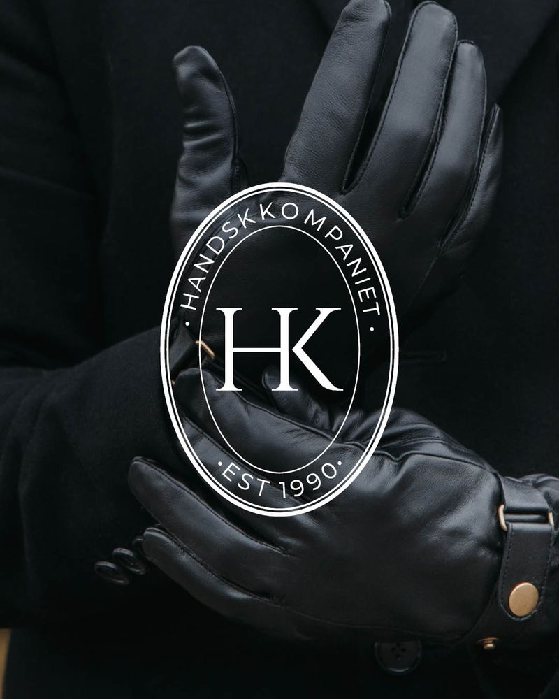 Handskkompaniet banner med svarte skinnhansker